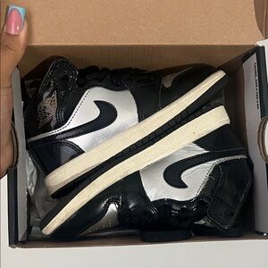 Black and Silver High-Top Nike Sneakers